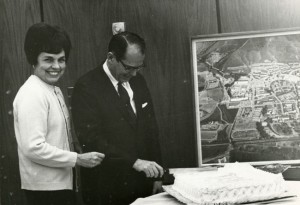 Mr. and Mrs. Kennedy with cake and map of Cal Poly