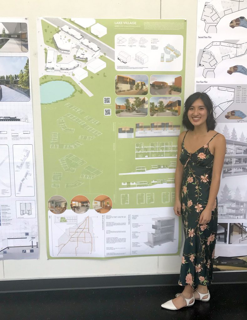 Ali Chen standing in front of her research poster